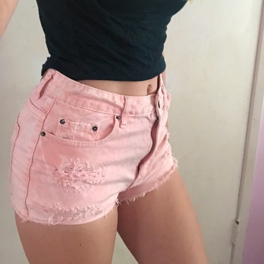 Pink, ripped BDG shorts